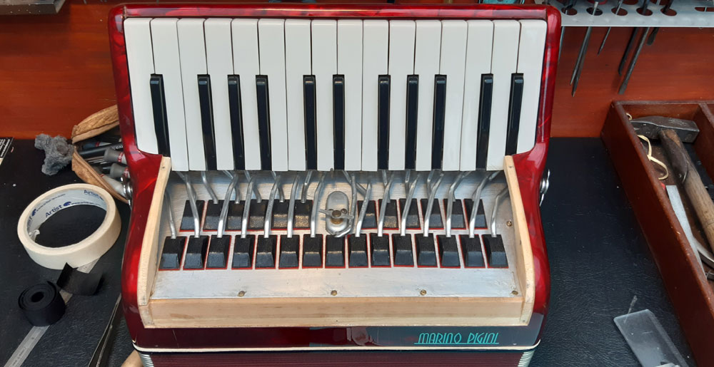 Réparation mécanique accordéon piano paris