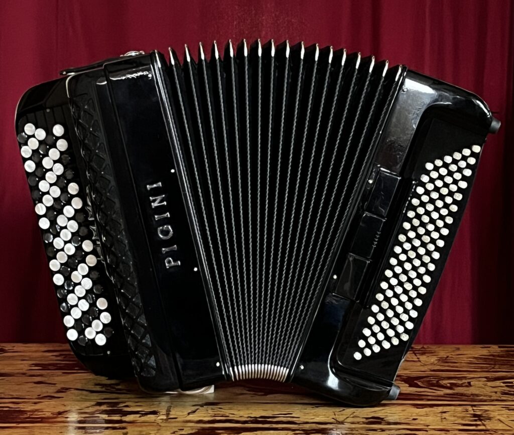 Accordéon-occasion-Pigini-Concertino 2-Basses chromatiques-déclancheur-Accordéons Paris Sud
